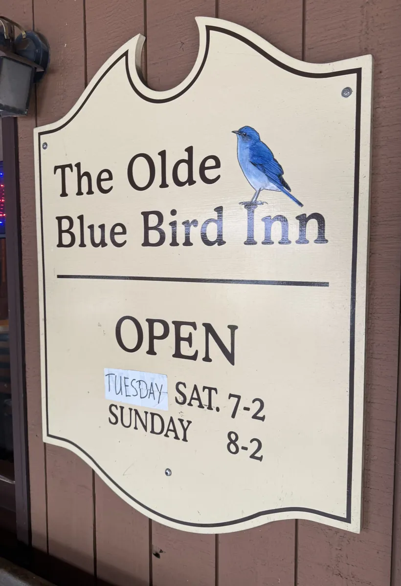 The hanging sign: The Olde Blue Bird Inn, open Tuesday to Saturday 7 to 2, Sunday 8 to 2